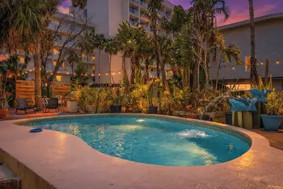 Image de Treasure Island Beach avec piscine, barbecue et WiFi 12 personnes