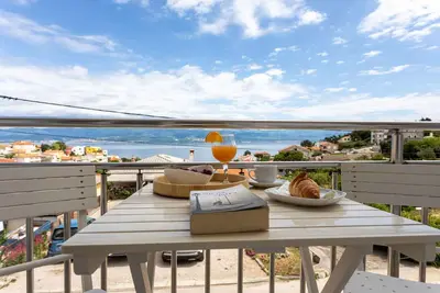 Image de Appartement de vacances avec un magnifique balcon avec vue sur la mer