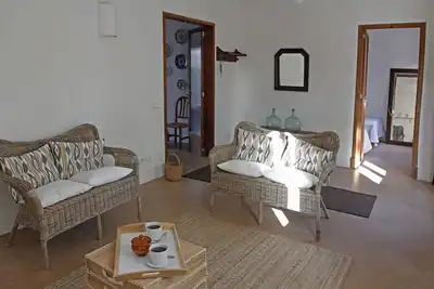 Image de Maison de la Méditerranée dans le port de pêcheurs de Cala Figuera