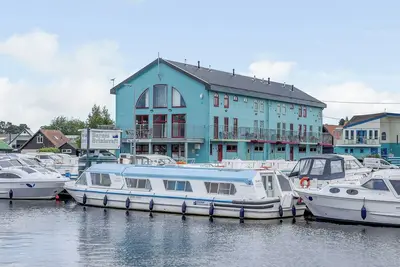 Image de 4 chambres Ă coucher Ă Wroxham