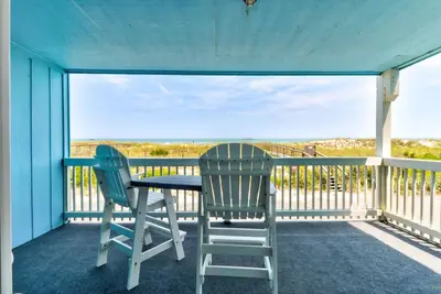 Image de Winds Iii B1: Cozy condo de 2 chambres en bord de mer avec une piscine communautaire et passage pour la plage