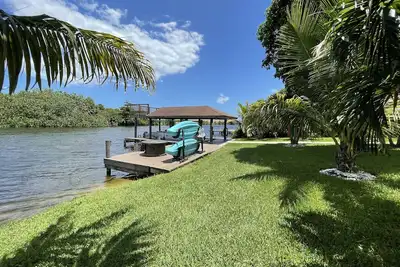 Image de Bord de l'eau à Palm Beach - Embarcadère privé, piscine, bain à remous, cinéma maison