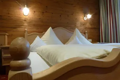 Image de Chambre double \"Grünberg\" avec coin salon - Pension Alpenhof - Pension de bien-être