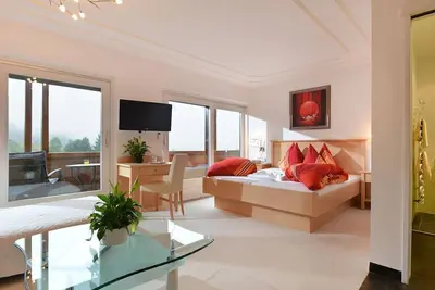 Image de Chambre double avec douche \/ Wc avec balcon et Kaiserblick - Café-Restaurant Bettina