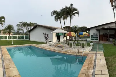 Image de Résidence spacieuse et confortable dans la station balnéaire de Cananéia / piscine et grand jardin