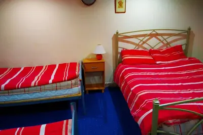 Image de Chambre Familiale Triple de Luxe avec Installations Communes - Alba Self Catering