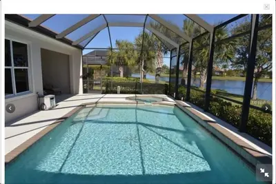 Image de Bord de l'eau Voir avec piscine privée dans une résidence Golf