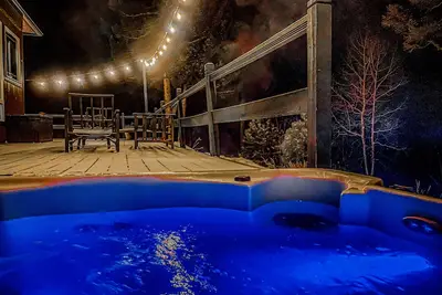 Image de Entouré de magnifiques vues sur la montagne, bain à remous et sauna à vapeur