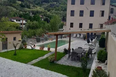 Image de Palazzo Ulqini. Riverside Villa Bagni Di Lucca.