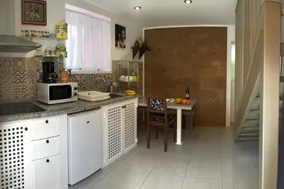 Image de Maison de village entièrement rénovée 4 appartements avec cour à Arico Viejo.