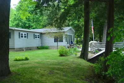 Image de River Country Lodge sur la rivière Muskegon côté de lancement Pine St bateau