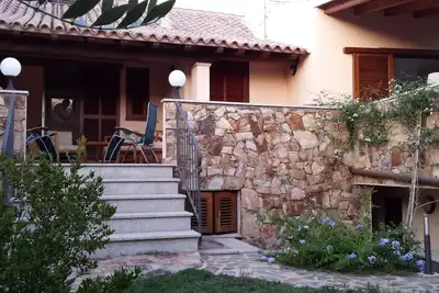 Image de Casa Baia Caddinas offre des vacances tranquilles et inoubliables.