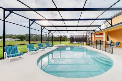 Image de Villa haut de gamme avec piscine et spa à proximité de Disney - Jusqu'à 12 personnes