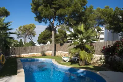 Image de Cala Dor Beachhouse avec 3 terrasses et piscine, vue mer panoramique + plage