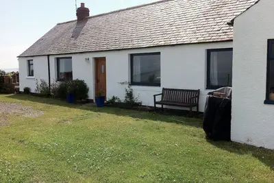 Image de Cottage avec jardin sécurisé, poêle à bois et vue sur la mer