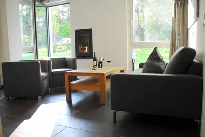 Image de appartement rez de chaussée de luxe avec sauna, jacuzzi et cheminée