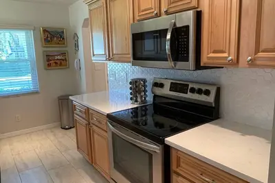 Image de Condo à Bardmoor avec piscine, bain à remous, tennis, golf
