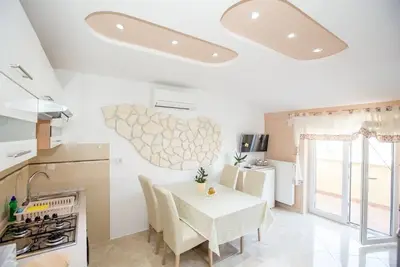 Image de Appartement dans Lopar avec Balcon, Climatisation, Wifi, Machine Ă laver (73-5)