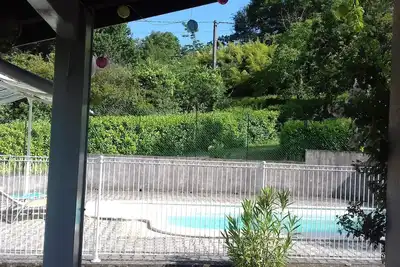 Image de L'idéale, villa avec piscine proche rivière et commerces.