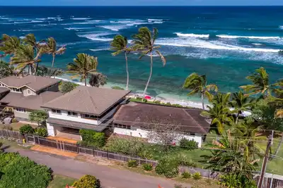 Image de Une vue imprenable sur le privé front de plage directe Pineapple Pad in Paradise
