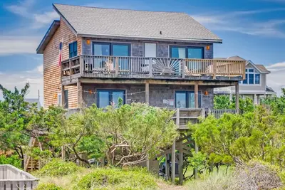 Oceanfront Avon w \/ accès direct à la plage! HotTub avec cascade, CmtyPool, DogFriendly