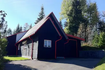 Image de Appartement dans les Monts Métallifères avec une vue panoramique sur l'Auersberg