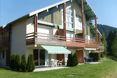 Image de Charmant appartement dans chalet, proximité pistes de skis et Centre ville
