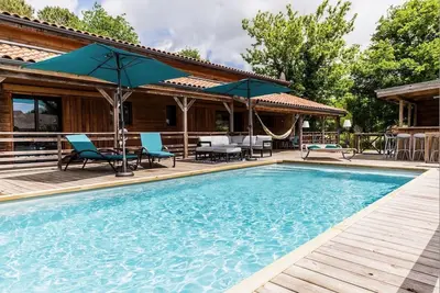 Image de Magnifique Maison En Bois Avec Piscine Chauffee A 10km De L Ocean