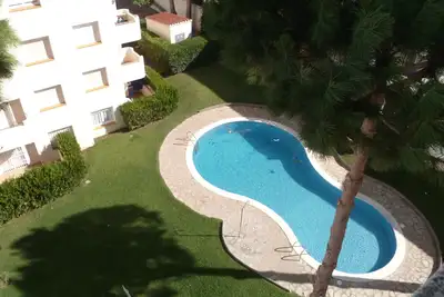 Appartement  avec piscine, balcon, wifi, place de parking privée, plage 600m