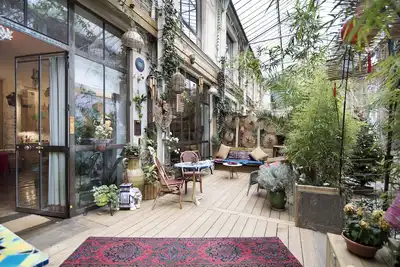 Image de Loft d'artiste avec terrasse dans Paris. Charme, calme, idéal famille.
