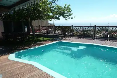 Image de Maison Joss St Denis, villa vue mer, piscine sécurisée, salle de jeux.