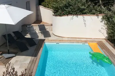 Image de Maison avec piscine privée, chauffée et sécurisée à 2min de Santa Giulia