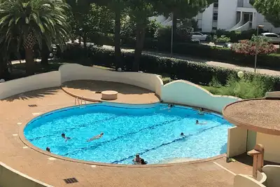 Image de Appartement avec piscine - garage - clim. - plage à 200m - Wifi