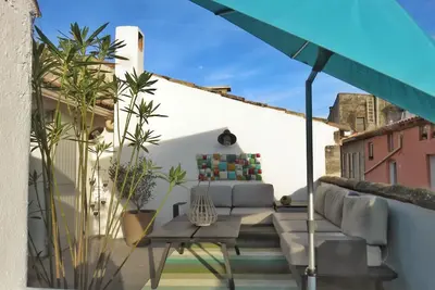 Image de Duplex centre village avec grande terrasse sur les toits orientée Sud (*****)