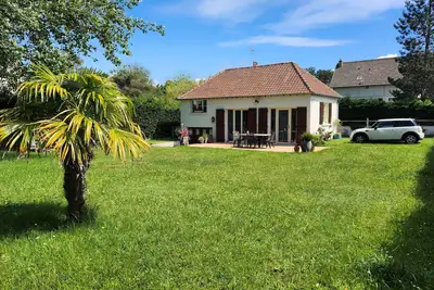 Image de Maison Neptune - 50m plage - grand jardin clos - vélos - wifi (fibre optique)