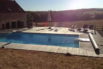 Image de Magnifique grange rénovée, 8 pers 4 ch, piscine chauffée privée, pleine campagne