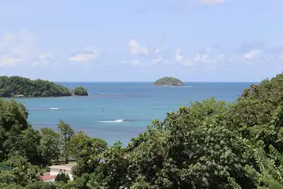 Image de Location de charme à Trinité avec vue mer et piscine.