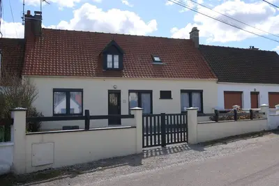 Image de Maison confortable au centre du village. 500m de la plage. 8 personnes