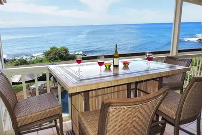 Image de ** ** Oceanfront Vues Sunset ** pied de la plage et du centre commercial ** ** Climatisation