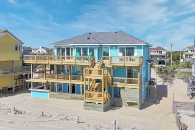 Le paradis des amateurs de plage! Oceanfront Avon avec bain à remous, bar Tiki, salle de jeux, piscine intérieure