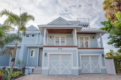 Image de Blue Sky: Luxe 5 Bdrm / 4 salles de bain avec piscine chauffée - 1 bloc de la plage!