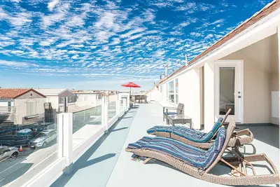 Image de Ocean Corner Corner Unit w Rooftop Deck - 1 maison Ă la plage - 13 personnes