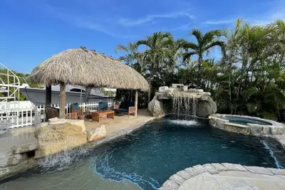 Image de Maison avec piscine au bord de l'eau avec accès rapide au golfe