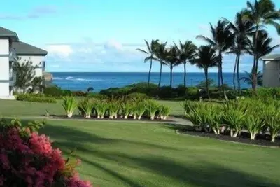 Image de Vues sur l'océan depuis ce 2 ch / 2 salles de bain au rez-de la famille Condo