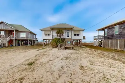 Waterfront Beach Cottage sur l'île Dauphin sur une plage de sable blanc