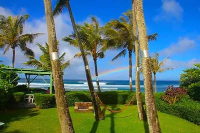 Image de Bungalow Sunset Oasis au bord de la plage au bord de la mer