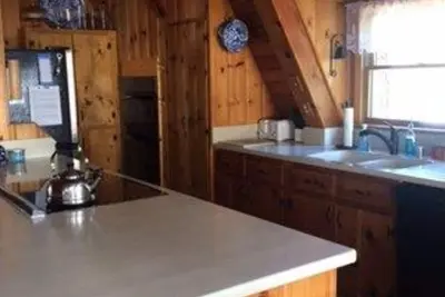 Image de Magnifique chalet au bord du lac
