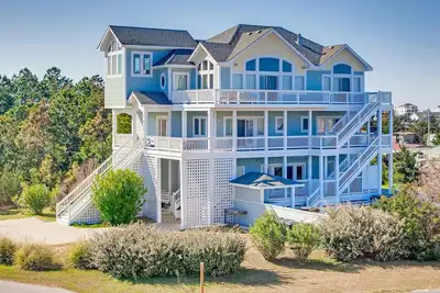 Image de Semi-face à la mer avec ascenseur, piscine et bar, bain à remous, théâtre et salle de jeux, DogFriendly
