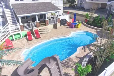 Image de Maintenant RÉSERVATION 2020 semaines de juin encore disponibles-piscine d'eau salée chauffée par oasis d'arrière-cour