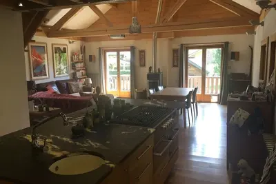 Image de Luxueux apt de 105 mètres carrés à double hauteur, à pied du ski et du golf